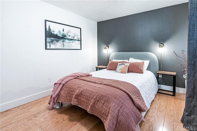 bedroom featuring light hardwood / wood-style floors