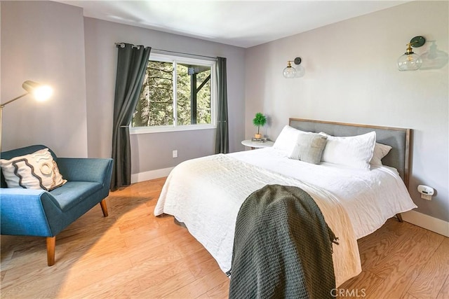 bedroom featuring light wood-type flooring