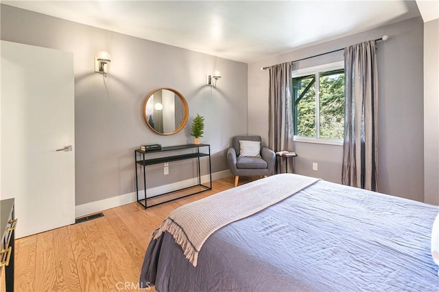 bedroom featuring light hardwood / wood-style flooring