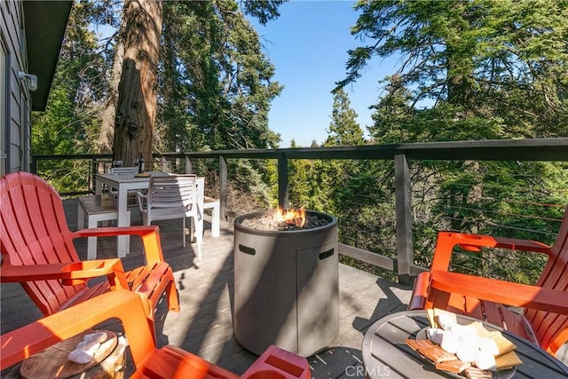 view of patio with a fire pit