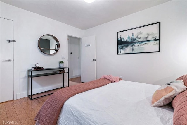 bedroom featuring light wood-type flooring