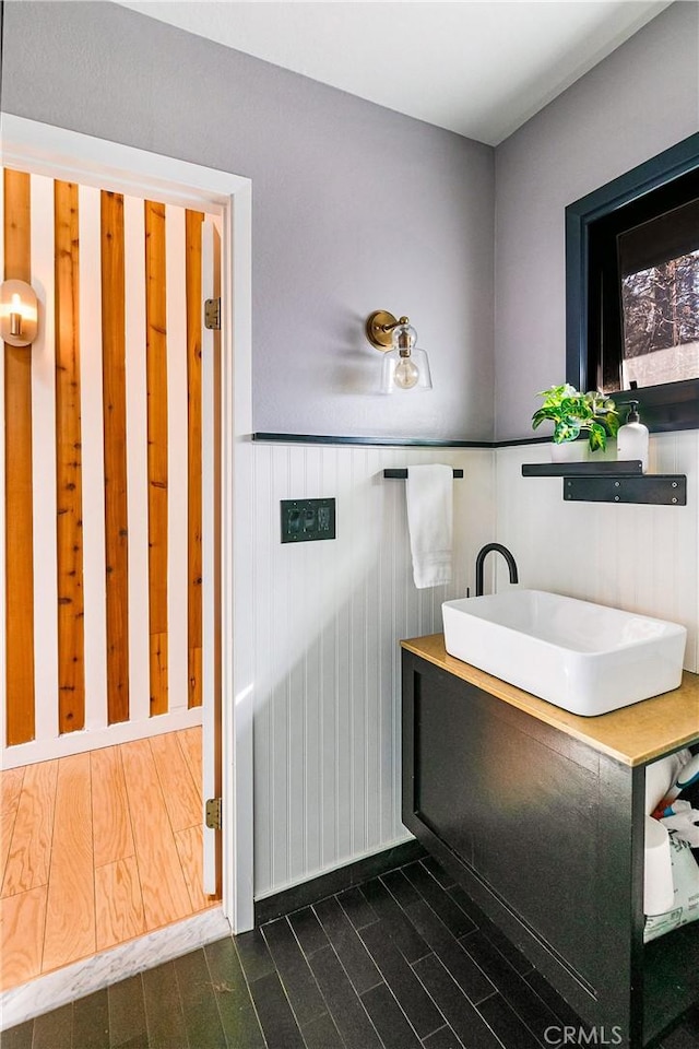 bathroom featuring sink and wood-type flooring