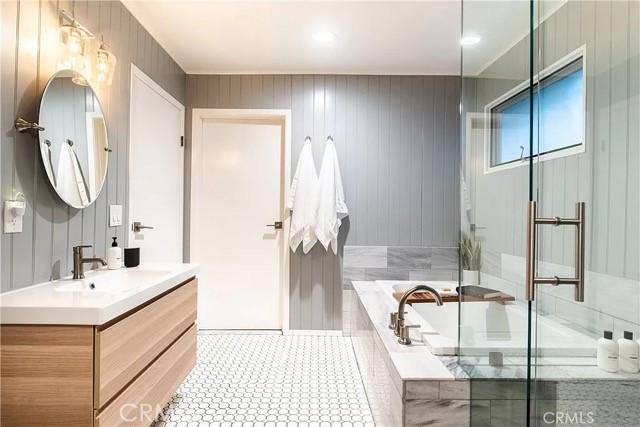 555 Dover Ct, Lake Arrowhead, CA 92352 - full bath featuring an enclosed shower, a garden tub, tile patterned flooring, and vanity