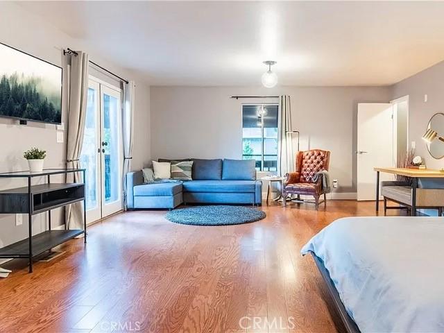 555 Dover Ct, Lake Arrowhead, CA 92352 - bedroom featuring access to outside and wood finished floors