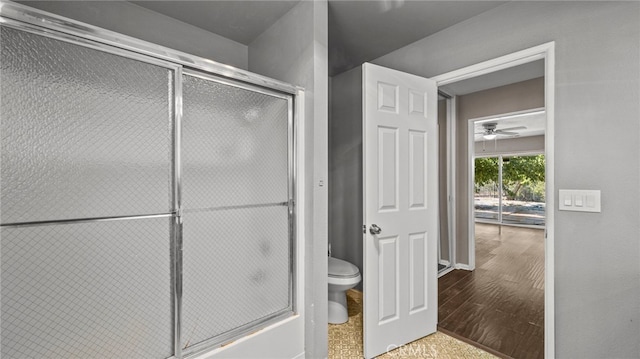 bathroom featuring toilet and hardwood / wood-style floors