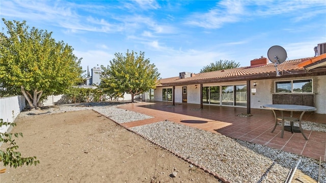 rear view of house with a patio area