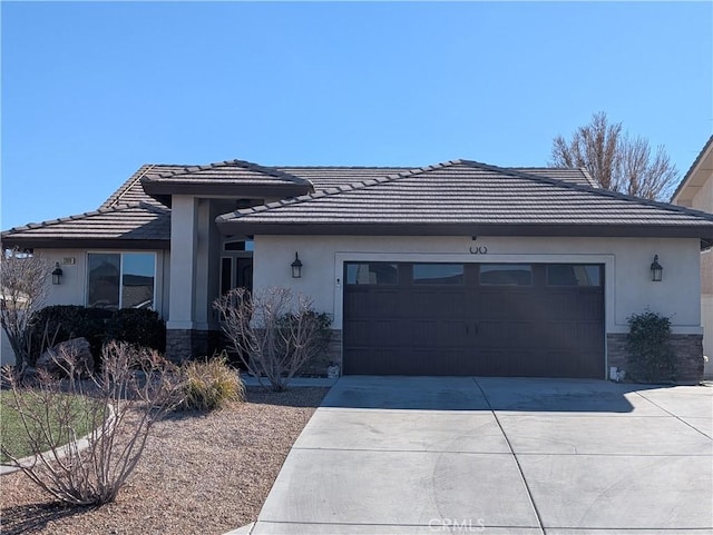 ranch-style house featuring a garage