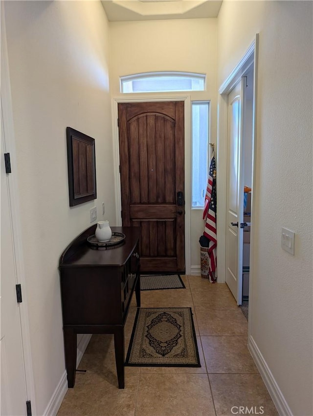 view of tiled foyer entrance