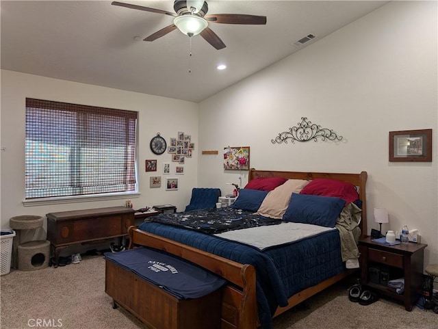 carpeted bedroom with lofted ceiling and ceiling fan