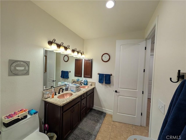 bathroom with vanity and tile patterned floors