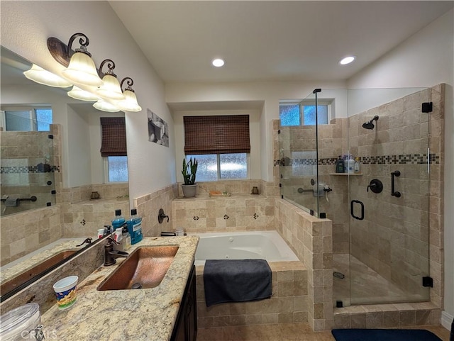 bathroom with vanity and plus walk in shower