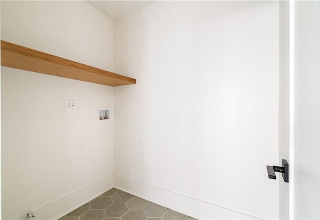 laundry area featuring tile patterned flooring and washer hookup