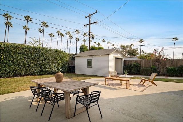 view of patio / terrace with a storage unit