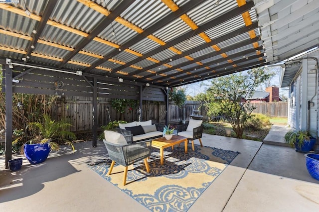 view of patio featuring outdoor lounge area and a pergola