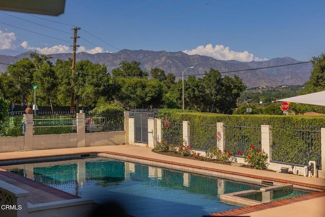 view of pool featuring a mountain view