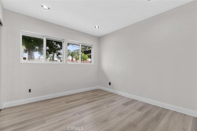 empty room featuring light hardwood / wood-style floors