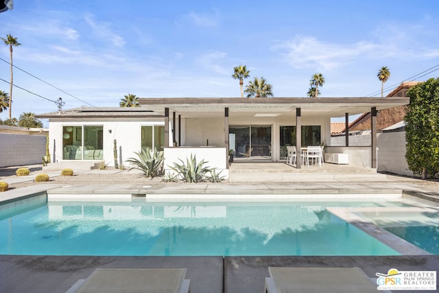 rear view of property with a patio