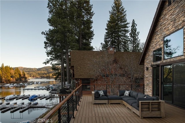 wooden deck with a water view