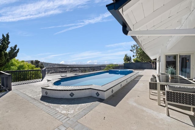 view of pool with a patio