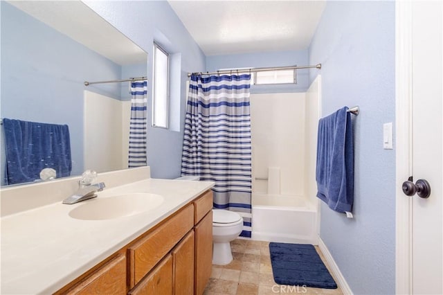 full bathroom with vanity, toilet, and shower / bath combo with shower curtain