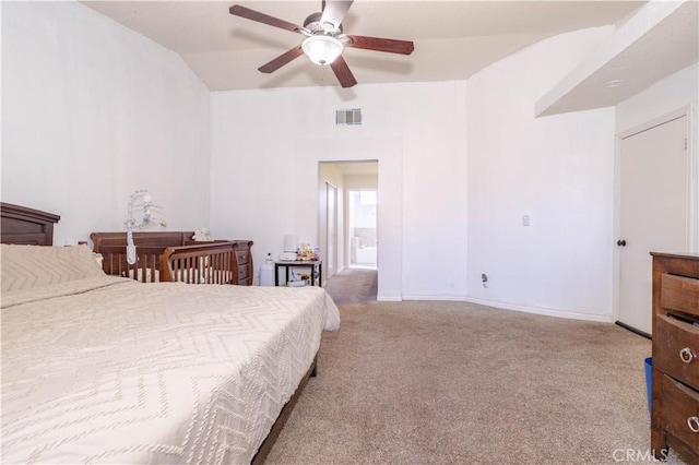 carpeted bedroom featuring vaulted ceiling and ceiling fan