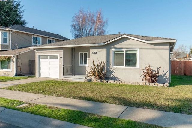 view of front facade featuring a garage and a front yard