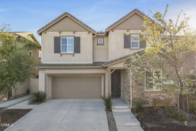 view of front of property with a garage