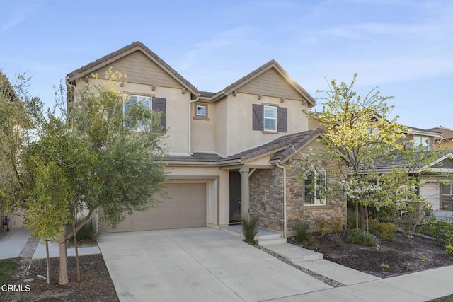 view of front of property featuring a garage