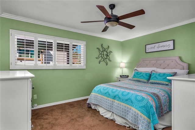 carpeted bedroom featuring crown molding and ceiling fan