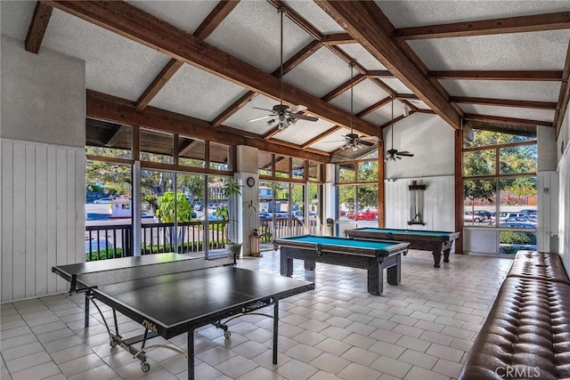 recreation room featuring light tile patterned flooring, a wealth of natural light, high vaulted ceiling, and billiards