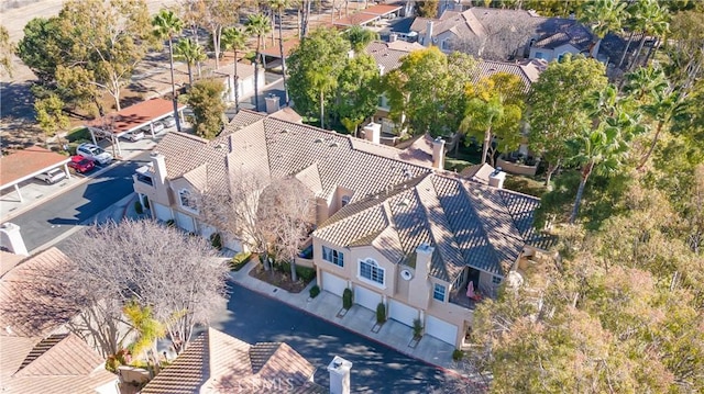 birds eye view of property with a residential view