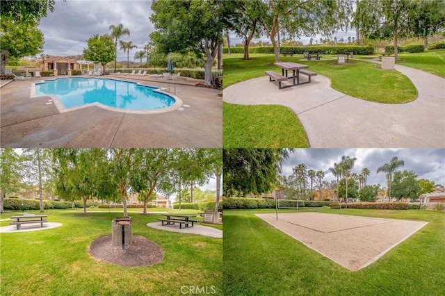 exterior space with volleyball court, a pool, and a yard