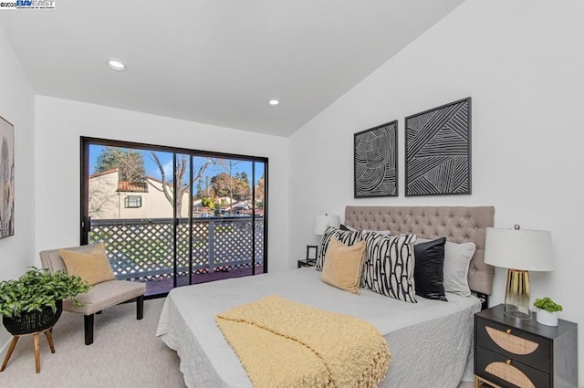 carpeted bedroom with lofted ceiling and access to exterior