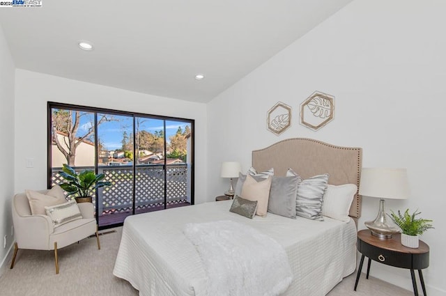 bedroom featuring light carpet