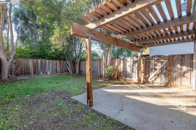 view of yard with a pergola and a patio area