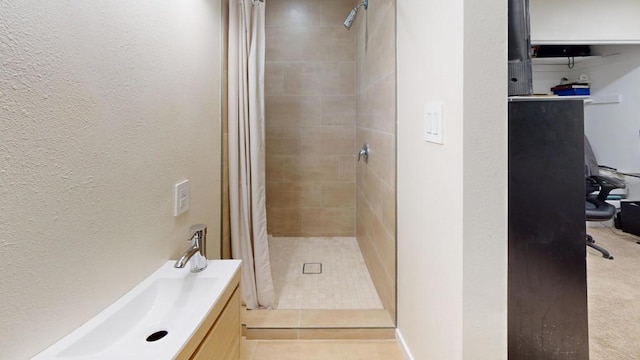 bathroom featuring tile patterned flooring and curtained shower