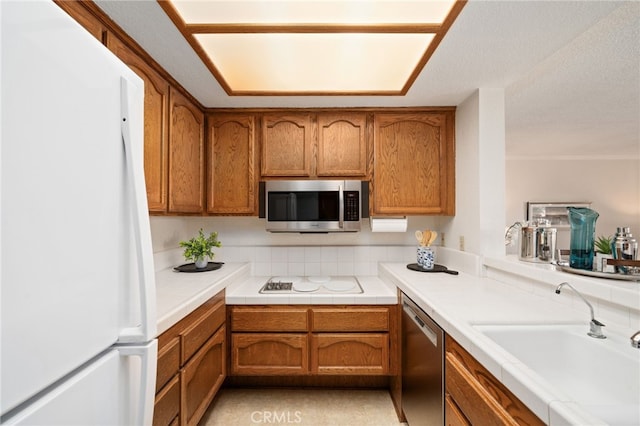 kitchen featuring stainless steel appliances and sink