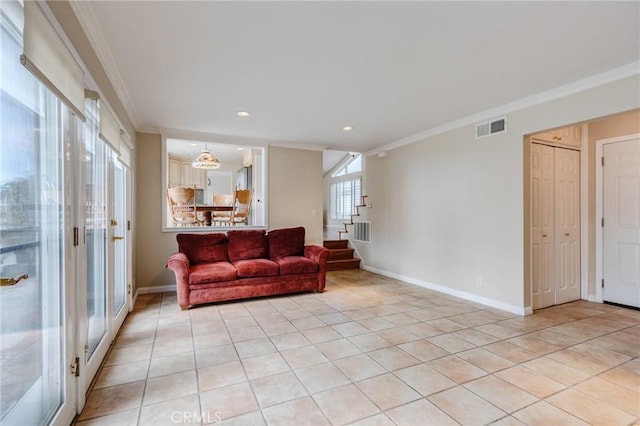 living room featuring crown molding and light tile patterned floors