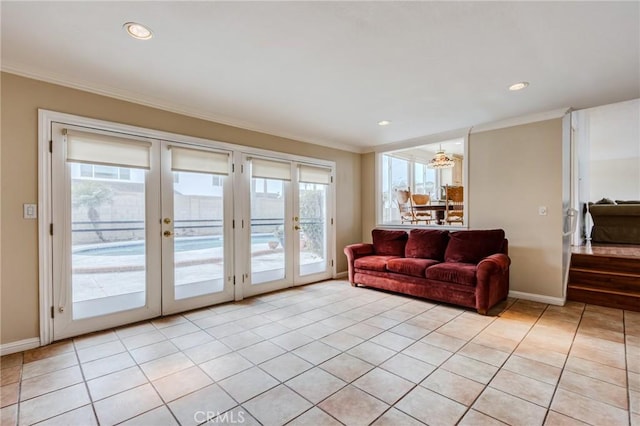 doorway featuring french doors, ornamental molding, and light tile patterned floors