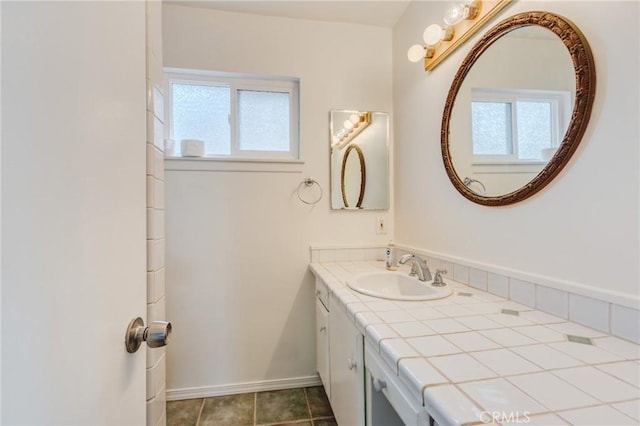 bathroom featuring vanity and tile patterned flooring