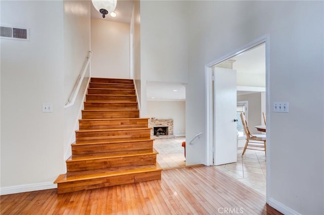 staircase with wood-type flooring