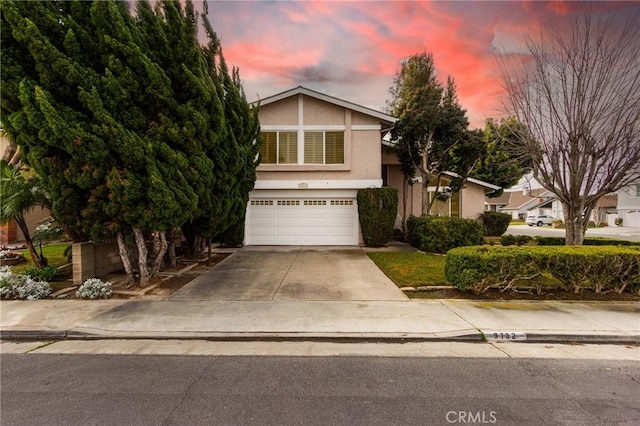 view of front of home with a garage