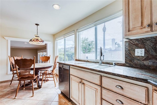 kitchen with pendant lighting, tasteful backsplash, sink, dishwashing machine, and light brown cabinets