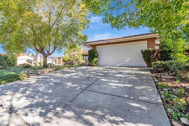 ranch-style home with a garage