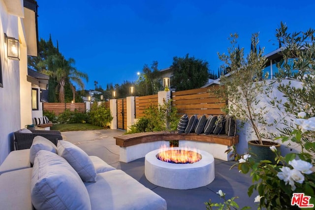 view of patio featuring an outdoor fire pit