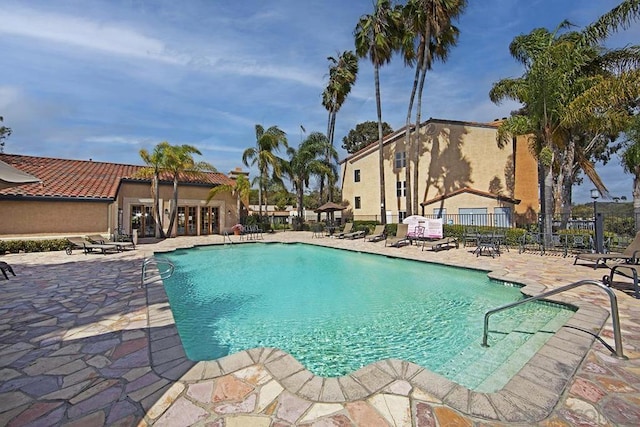 view of pool featuring a patio