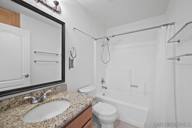 full bathroom featuring vanity, toilet, and shower / tub combo