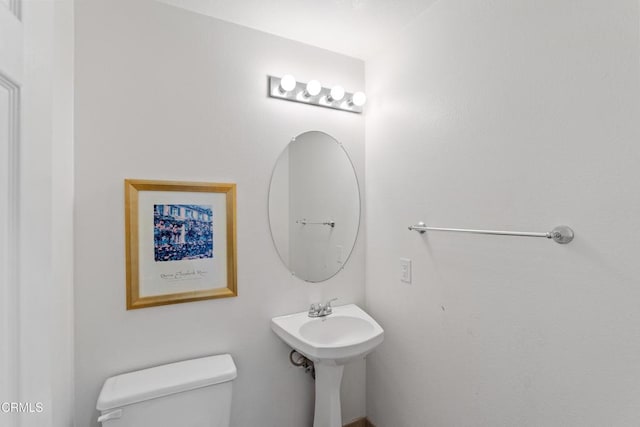 bathroom featuring toilet