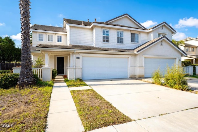 front facade with a garage