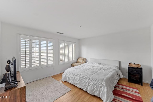 bedroom featuring hardwood / wood-style flooring